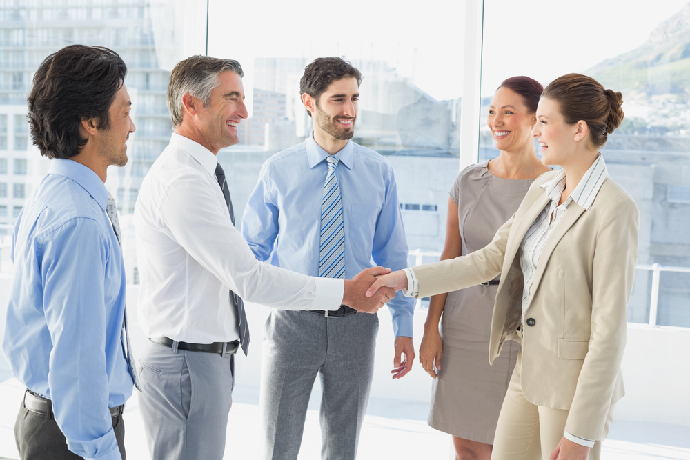 Employees having a business meeting in a conference room