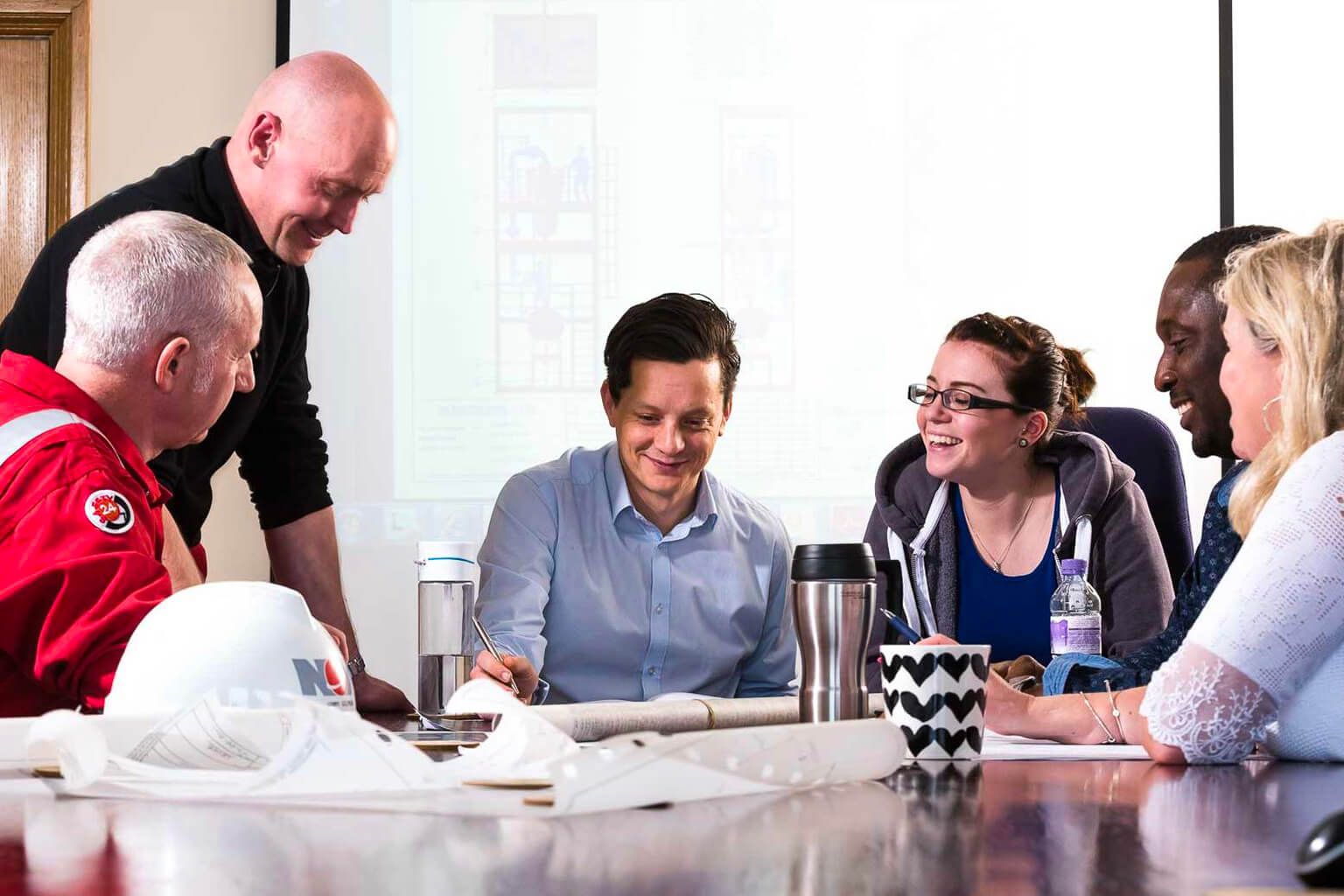 People around an office desk