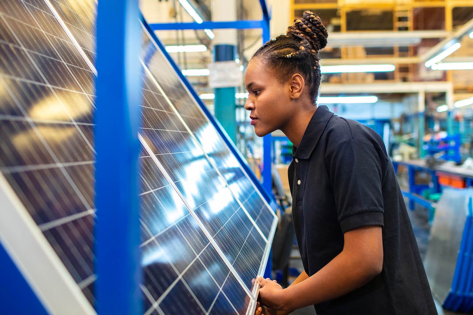 Person looking at solar panels at store