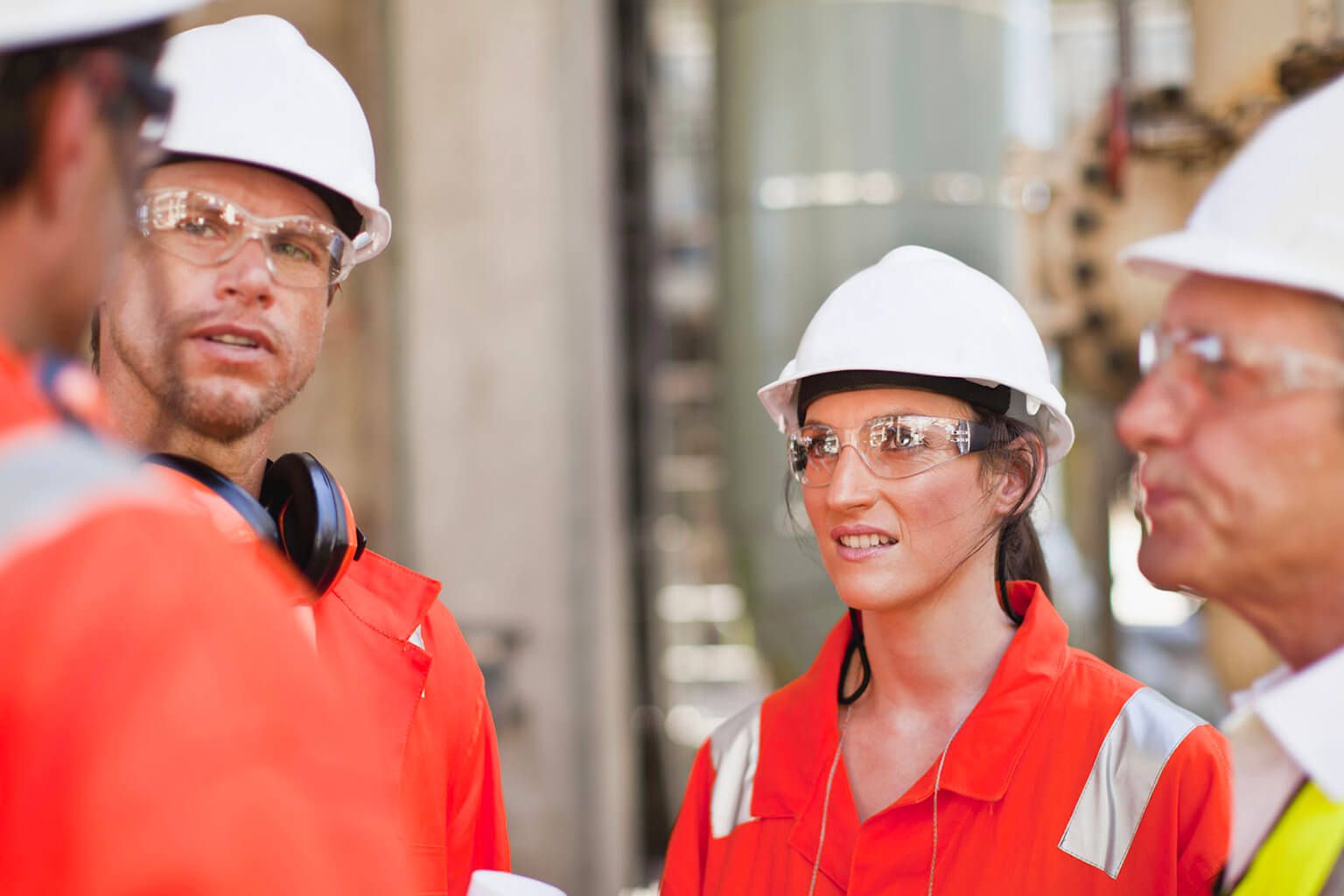 People in hardhats and reflective gear